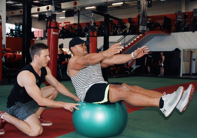 core strength training - sit ups on a fit ball